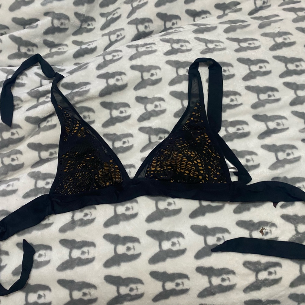 Black and nude bikini top